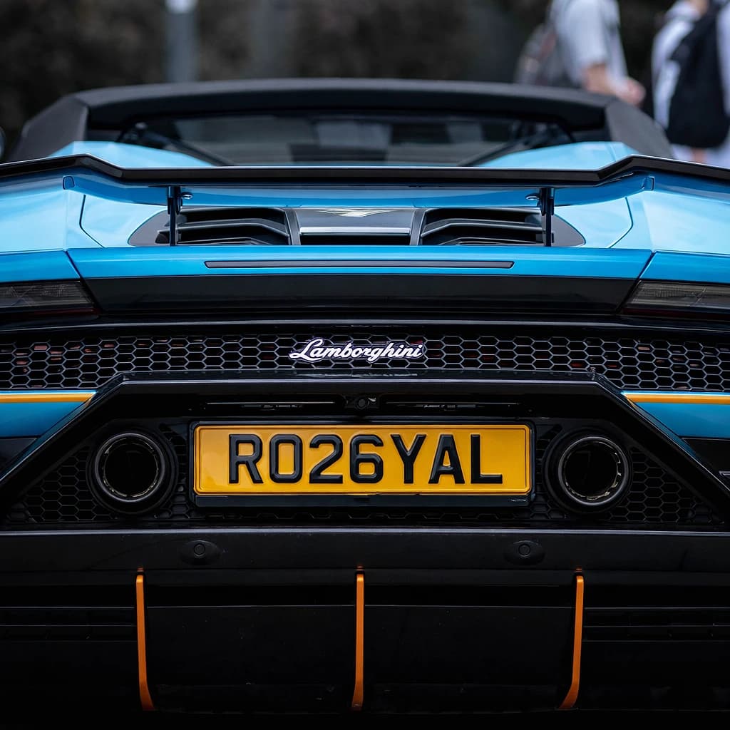 Photo of a Blu Nethuns Blue Lamborghini Huracan supercar showing the private number plate RO26 YAL, which reads as Royal and is currently available for sale for £17,850.